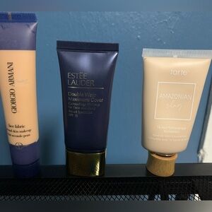 Three gently used high end foundations.